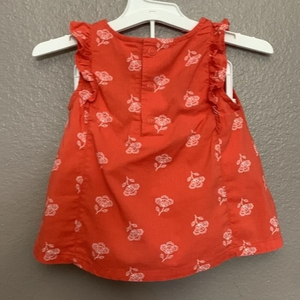 Carter's 12 month baby girl set of top and shorts.